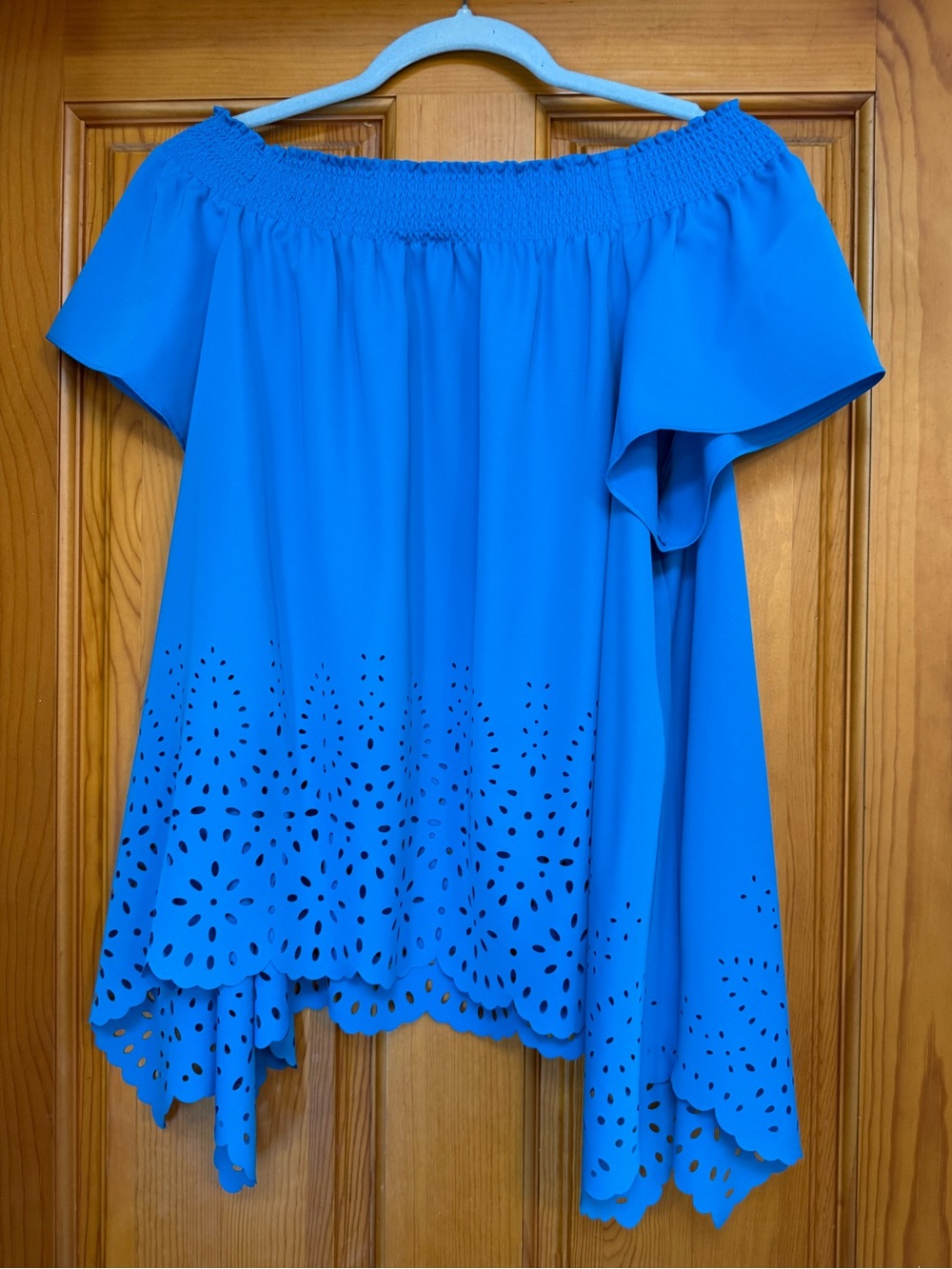 Jones of New York bright blue top. Can be worn off-shoulder too